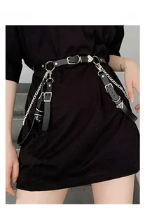 Detail view of punk style PU leather belt with multiple silver buckles and metal chains