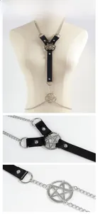Detail of gothic leather body chain featuring silver metal stars and harness straps