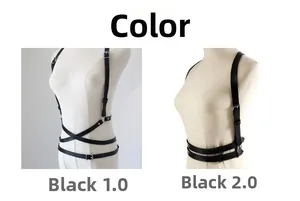 Detail view of two black leather body harness styles with silver buckles and cross straps