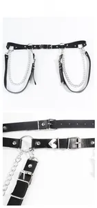 Detail of black PU leather body harness featuring silver metal chains and heart-shaped buckles