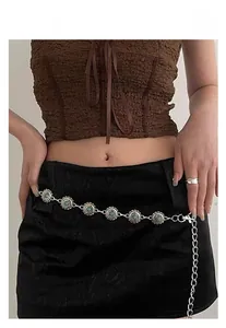 Detail view of retro ethnic silver waist chain with turquoise beads for dresses