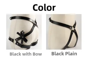 Detail of black PU leather body harness with silver metal buckles and leather bow detail