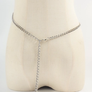 Close-up of gothic silver metal body chain with thick links and adjustable lobster clasp