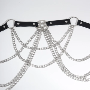 Detail of punk black PU leather body chain with silver metal stars and multi-layer fringes