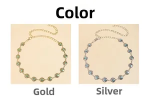 Detailed macro view of bohemian sunburst metal waist chains in gold and silver finishes