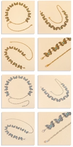 Detailed view of bohemian butterfly metal waist chains with turquoise stones in gold and silver