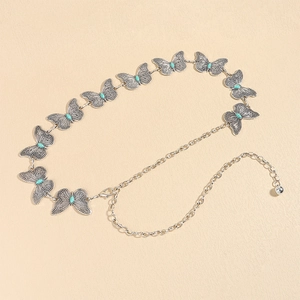 Detail of vintage silver butterfly waist chain with turquoise stones and lobster clasp