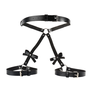 Punk black leather waist and leg harness with silver O-rings and decorative bows