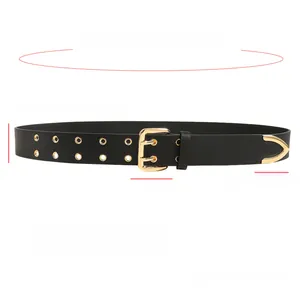 Detail of black leather belt with double metal eyelets and gold alloy pin buckle