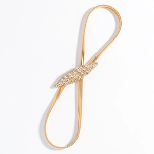 Women's gold elastic metal spring belt with a rhinestone buckle for dresses