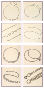 Detailed views of silver star pendants and cuban chain belt with happy smile charm