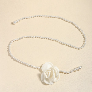 Elegant pearl waist chain belt featuring a white camellia flower for dresses and coats