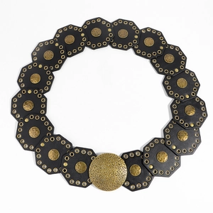 Retro wide waist belt featuring black octagonal leather tiles and brass metal accents