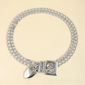 Detail of double-layer metal waist chain with square buckle and tapered pendants