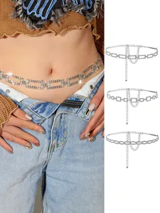 Detail of silver rhinestone waist chain showing adjustable clasp and metallic pendants