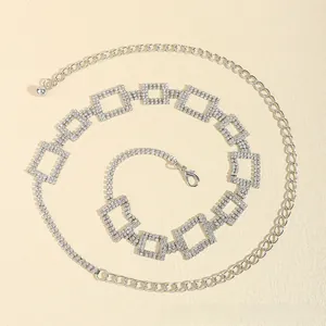Detail of silver rhinestone waist chain with square links and adjustable lobster clasp