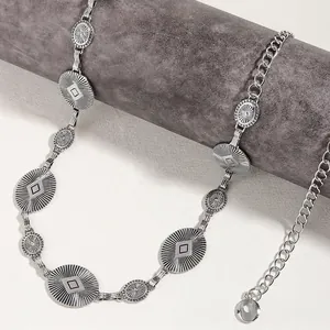 Bohemian silver metal waist chain with sun-textured oval and circular discs