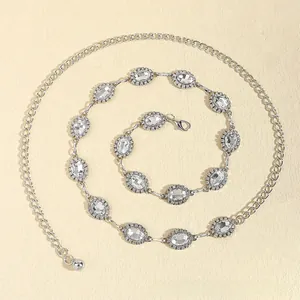 Close-up of silver rhinestone waist chain with oval crystals and adjustable lobster clasp