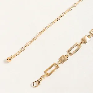 Elegant gold geometric chain belt for dresses featuring polished square and rectangular links