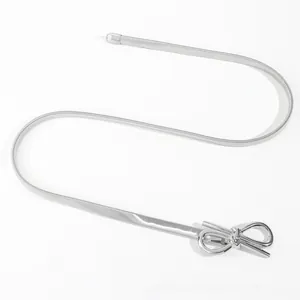 Close-up of elastic silver metal waist chain with a polished bow buckle on white background