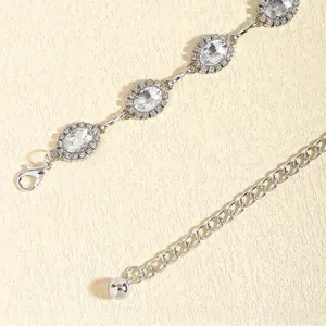 Fashionable silver crystal waist chain belt with oval rhinestones and lobster clasp