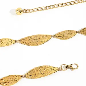 Golden metal leaf chain belt with hand-hammered texture for stylish dresses and outfits