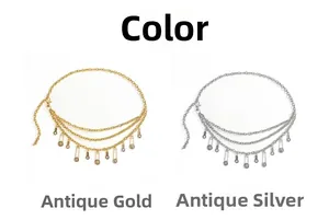 Detail view of multi-layer metal waist chains in vintage gold and silver coin pendants