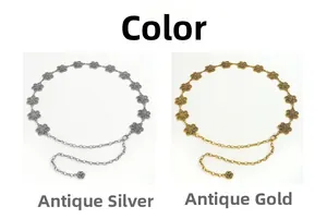 Detail view of hollow flower metal waist chain in antique gold and silver finishes