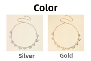 Detail view of Bohemian shell charms on adjustable gold and silver metal waist chains