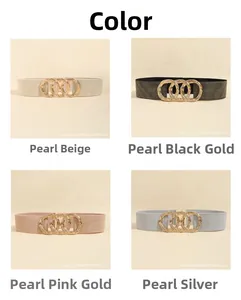 Detail view of interlocking metal buckles on elastic waist belts in four chic colors