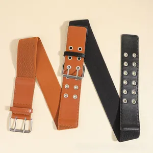 Detail of wide elastic waist belts with double-row metal eyelets in black and brown