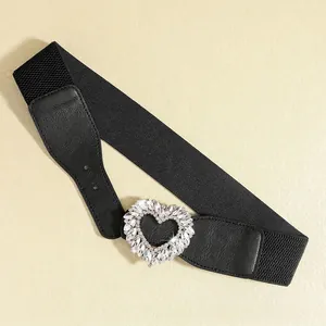 Elastic waist belt for women with heart shaped rhinestone buckle on black stretch band
