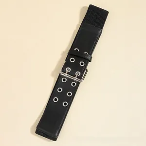 Close-up of wide black elastic belt with double-row silver grommets and metal buckle