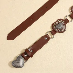 Bohemian brown leather belt featuring vintage silver heart buckles and hollow metal rings