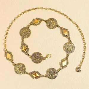 Bohemian gold metal waist chain featuring vintage woven medallions and diamond charms