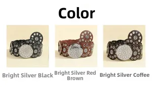 Close-up of vintage Bohemian belts in black, brown, and coffee with silver metal studs