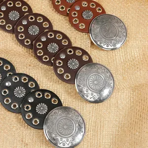 Vintage western leather waist belt with silver concho discs in black and brown tones