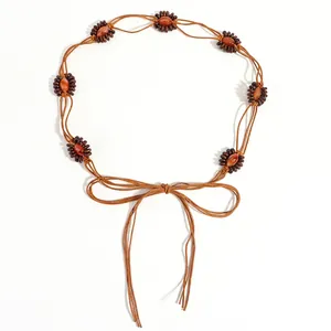Ceinture tressée bohème avec boucles ovales à perles brunes et fermeture à nœud simple