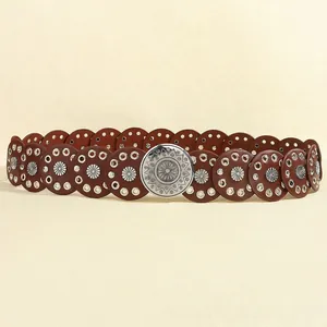 Vintage bohemian brown disc waist belt with silver floral studs and round buckle