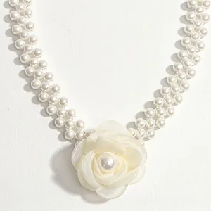 Elegant camellia pearl waist chain belt featuring double-row beads and a satin rose flower
