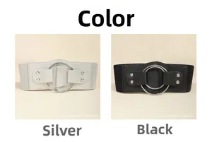 Detail of trendy elastic waist belts featuring double silver rings and rivet accents