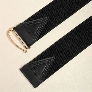Elastischer schwarzer Taillengürtel mit goldener Schnalle und Lederbesatz