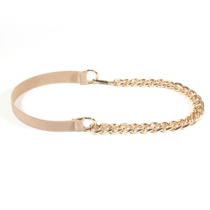 Detail of a beige elastic waist belt with a chunky gold metal chain and ring buckle
