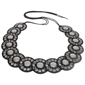 Detail view of Bohemian belt featuring black PU discs with embossed silver metal accents