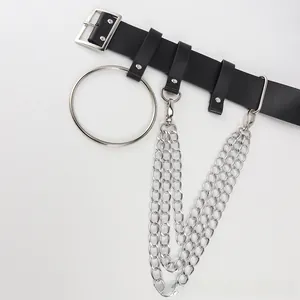 Detail of punk leather belt featuring large silver O-ring and triple metal chains