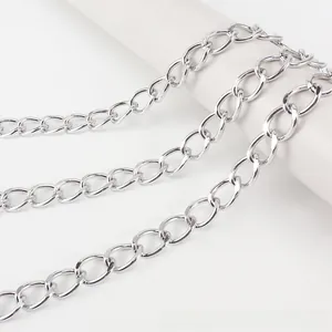Detail of multi-layered silver metal chain with flat oval links for punk style waist belts