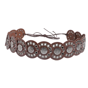 Bohemian dark brown faux leather belt with vintage silver embossed metal discs on white background