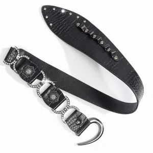 Ceinture noire chic à motif crocodile avec des accents floraux métalliques scintillants