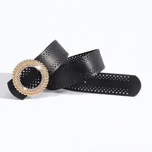 Ceinture femme vintage en cuir noir avec boucle ronde dorée ornée de cristaux brillants