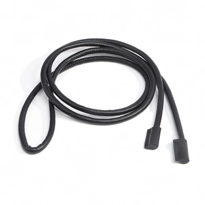 Close-up of black leather knotted waist rope showing fine texture and stitched edge details